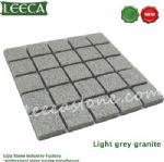 Tumbled light gray granite cobble stone mat