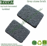 Bush hammered grey granite stone brick